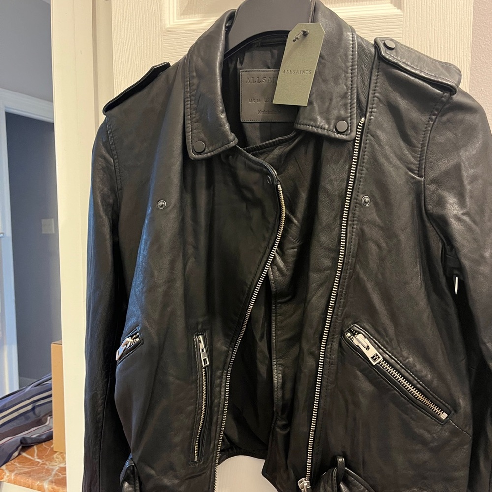 Soft leather motorcycle style jacket. New with tags. Size 12